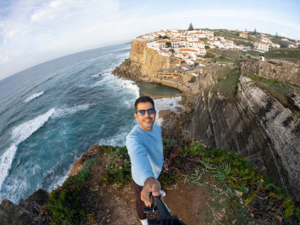 istock Adult man taking a selfie at Azenhas do Mar 1461096018