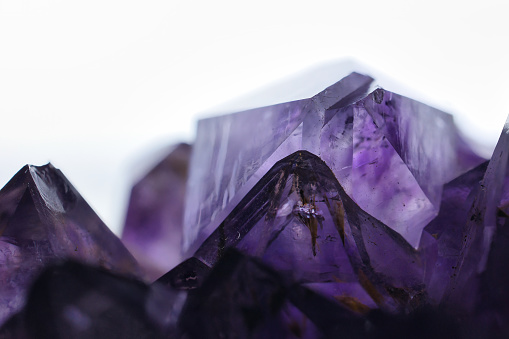 A beautiful cut amethyst gemstone that shines purple