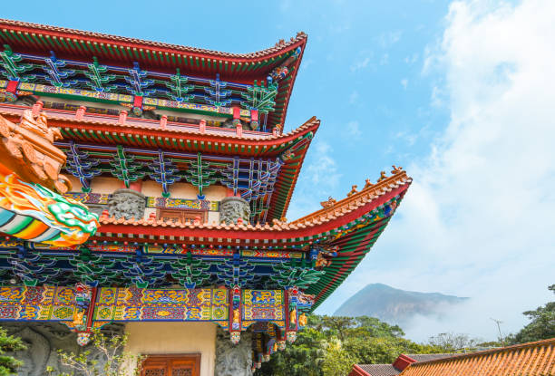 colorful chinese temple roof with blue sky background, hong kong. - hong kong china chinese culture pagoda imagens e fotografias de stock