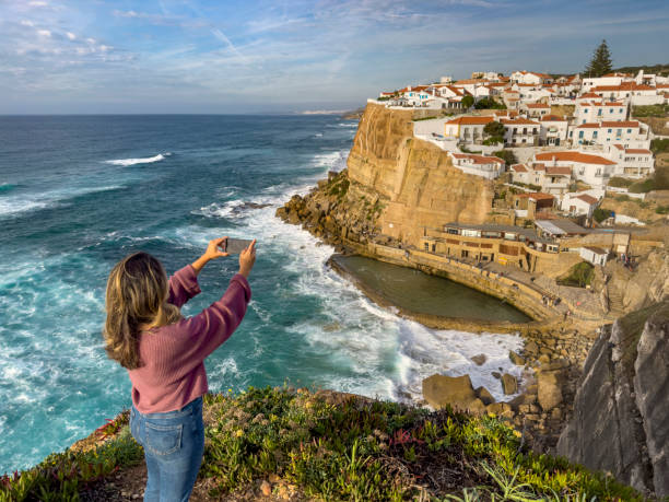 istock Woman taking photo at the observation point 1461097184