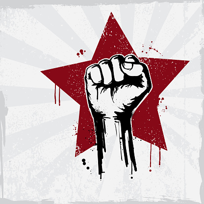 Retro fist graffiti on a red star grunge background