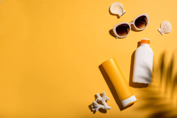 istock Sunblock lotion tubes and sunglasses 1461101000