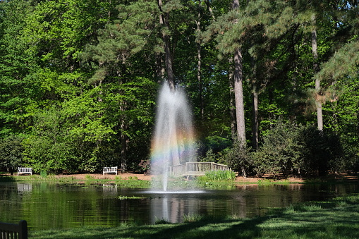 Garden fountain with a rainbow