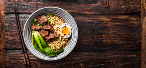 istock Ramen Asian noodles soup with beef 1461101505