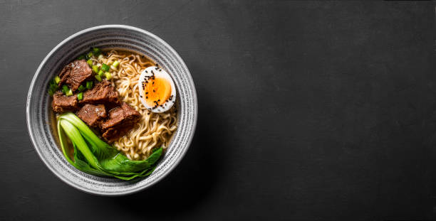 istock Ramen Asian noodles soup with beef 1461101549
