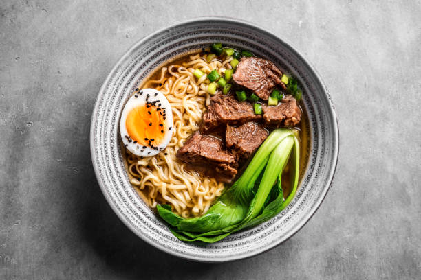istock Ramen Asian noodles soup with beef 1461101622
