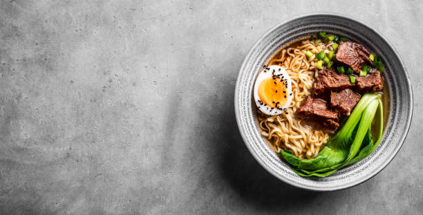 istock Ramen Asian noodles soup with beef 1461101674