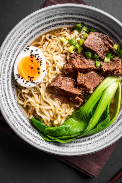 istock Ramen Asian noodles soup with beef 1461101730