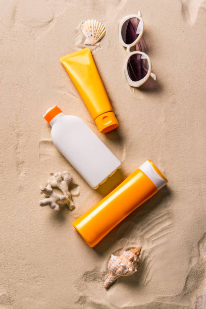 istock Sunblock lotion bottles and sunglasses 1461103988