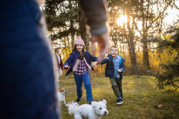 istock Happy family in park 1461104272