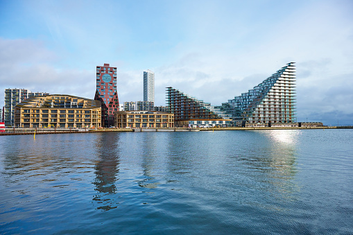 Settlement on Aarhus Island. The location has become very popular and exclusive. It includes the tallest building in Denmark 142 meter called the lighthouse. View from the ferry terminal.