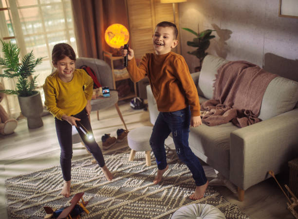istock happy young girl playing with her brother during playtime 1461106119