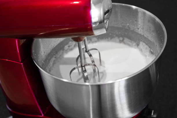 istock red mixer that whips the cream in the kitchen 1461107701