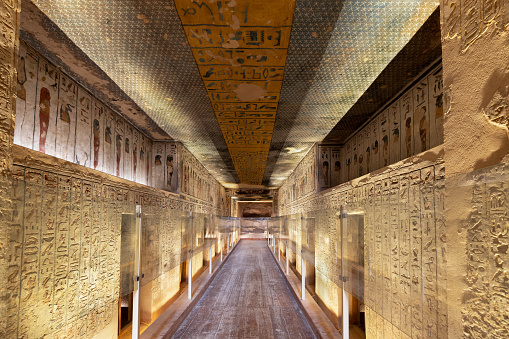 Columns with hieroglyphs at the Mortuary Temple of Ramesses III at Medinet Habu, Luxor, Egypt on sunny day.