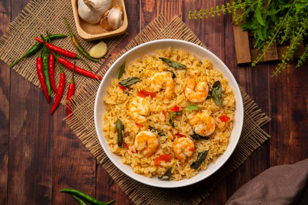 istock Spicy Shrimp Fried Rice with thai holy basil leaves 1461119927
