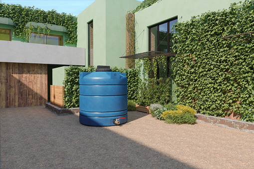 Exterior Of Villa With Rainwater Tank In Garden