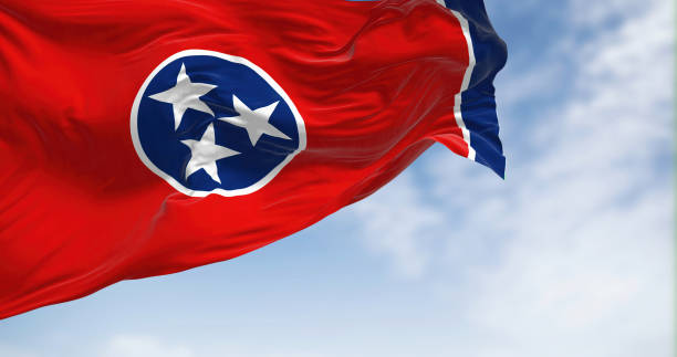 istock Tennessee state flag waving on a clear day. 1461121829
