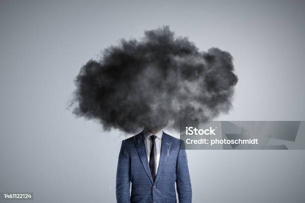 Person With A Dark Cloud Over The Head Stock Photo - Download Image Now - Storm Cloud, Hopelessness, Despair
