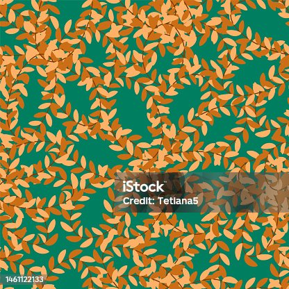 istock Seamless simple cute pattern from yellow, beige and brown leaves on green emerald background 1461122133