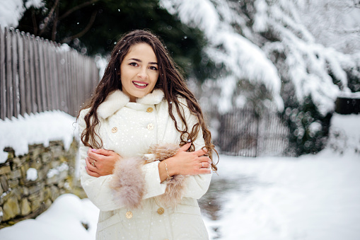 Young woman enjoying beautiful winter day