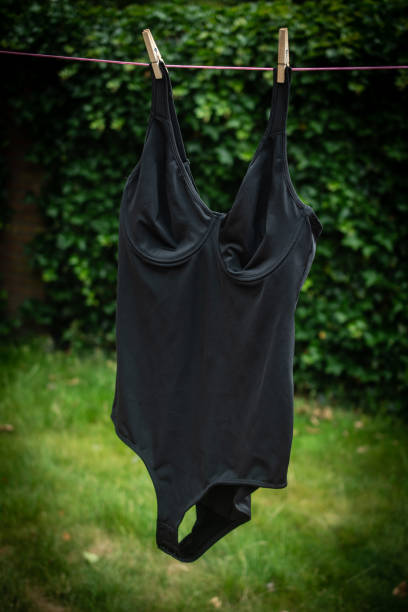 istock Black bodysuit drying outside on clothesline 1461125133