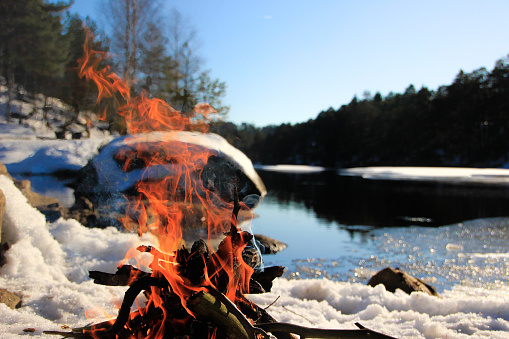A bonfire in winter, in the hiking areas of Kaldveld, Lillesand (Norway).
