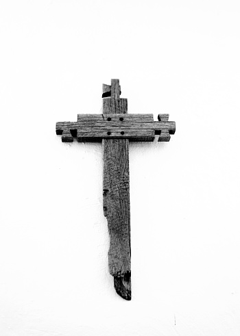 Rustic Wood Religious Cross on White Wall