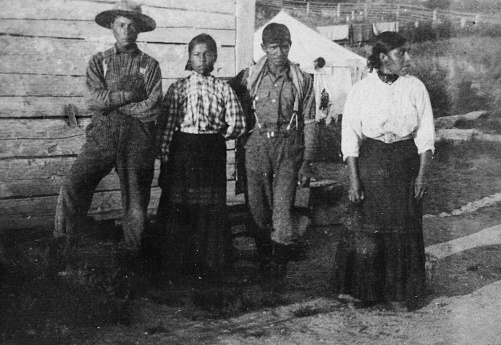 Pelican Narrows, Saskatchewan, Canada - 1919. Family of Cree indigenous people at Pelican Narrows in Saskatchewan, Canada. File source is film. Ca. 1919
