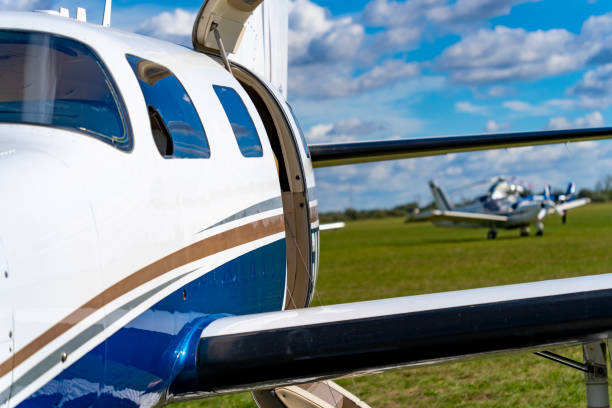 istock Airplane with open door at an airport 1461140464