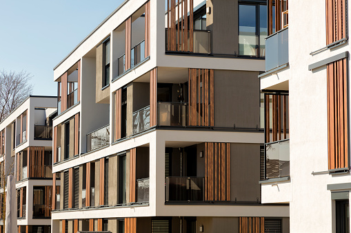 architectural details of a contemporary white building on sunny day