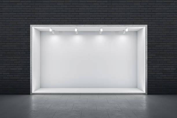 Front view on blank white illuminated niche with place for car or product presentation in abstract empty hall with dark brick wall background and glossy floor. 3D rendering, mock up stock photo