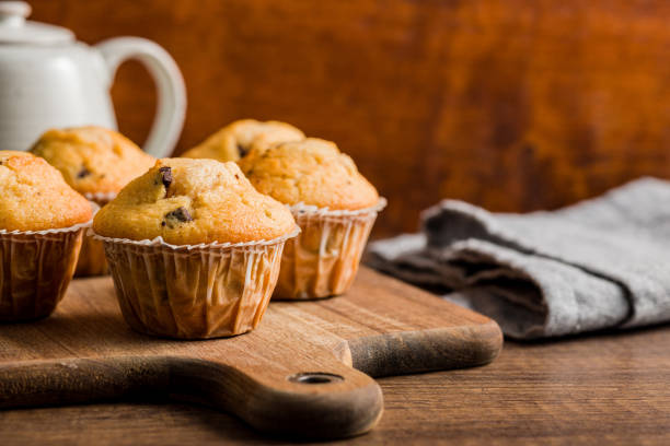 istock Sweet vanilla muffins  on cutting board. 1461148335