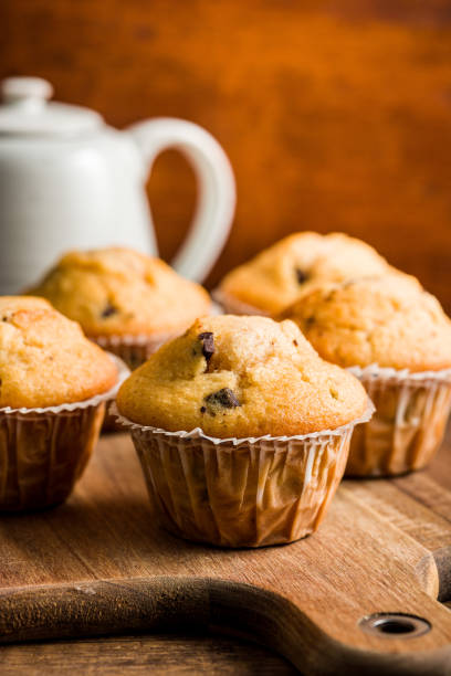 istock Sweet vanilla muffins  on cutting board. 1461148355