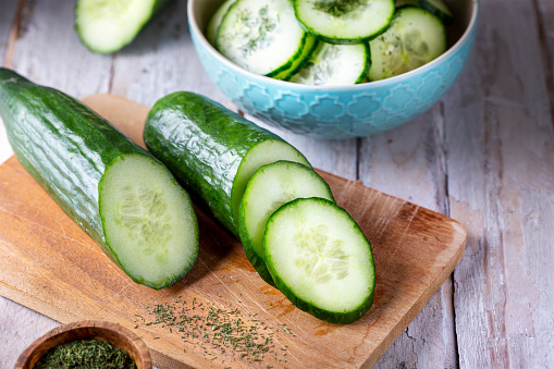 Fresh cucumber and slices