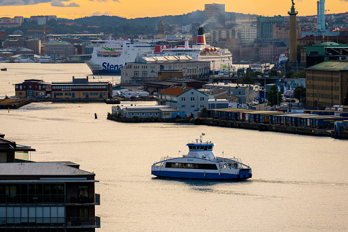 Gothenburg, Sweden - August 31 2022: Passenger ferries crossing the river at Stenpiren.