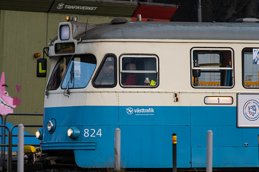 Gothenburg, Sweden - november 13 2022: Classic tram passing through the city streets.