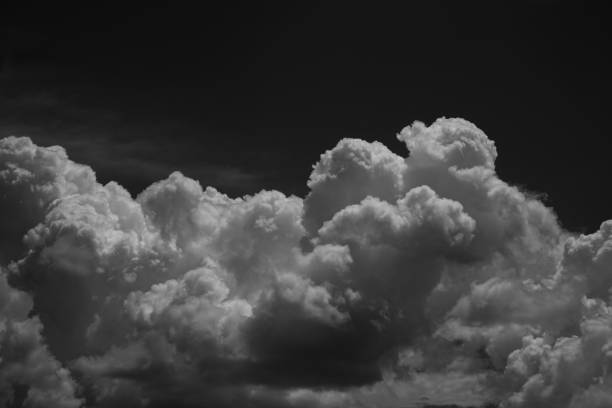 istock Black white night sky background for design. Dark cumulus clouds. 1461153385