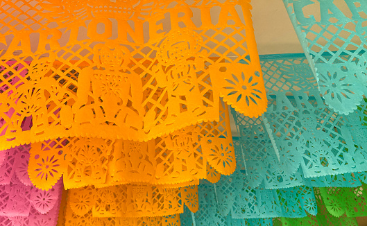 Colorful Rows pf Mexican Papel Picado Hanging from Ceiling