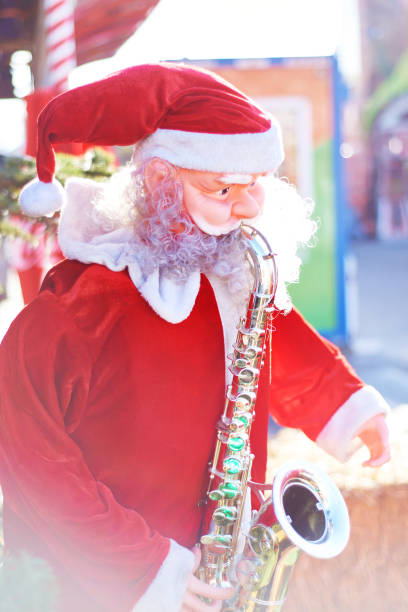 istock Santa Claus with saxophone 1461158674