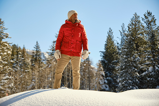 A man snowshoeing in the Utah USA mountains.