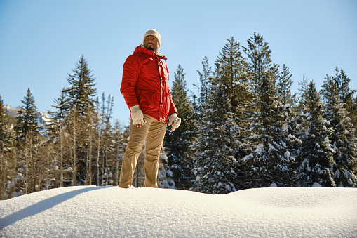 A man snowshoeing in the Utah USA mountains.