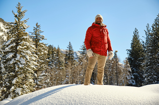 A man snowshoeing in the Utah USA mountains.