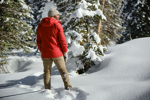 A man snowshoeing in the Utah USA mountains.