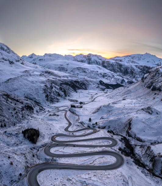istock A snake shaped pass road in winter photographed from above 1461168417