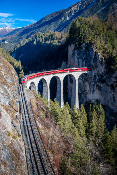 istock A train going through a tunnel onto a bridge.in the mountains Landwasser viaduct 1461168748
