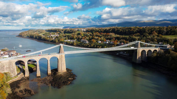 Menai Suspension Bridge, Bangor, Wales Menai Suspension Bridge, Bangor, Wales, Thomas Telford Bridge conwy castle stock pictures, royalty-free photos & images