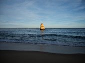 Panorama view of rock formations at Praia do Camilo picturesque atlantic ocean sand beach in Lagos Algarve Portugal