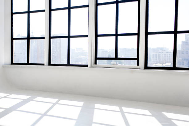 istock White spacious room with large unfurnished windows 1461194185