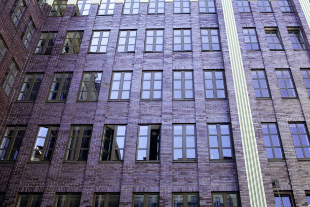 istock Tall building with large windows in the city center 1461194564
