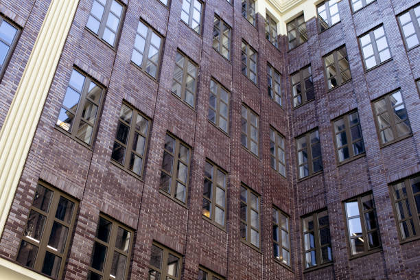 istock Tall building with large windows in the city center 1461194568
